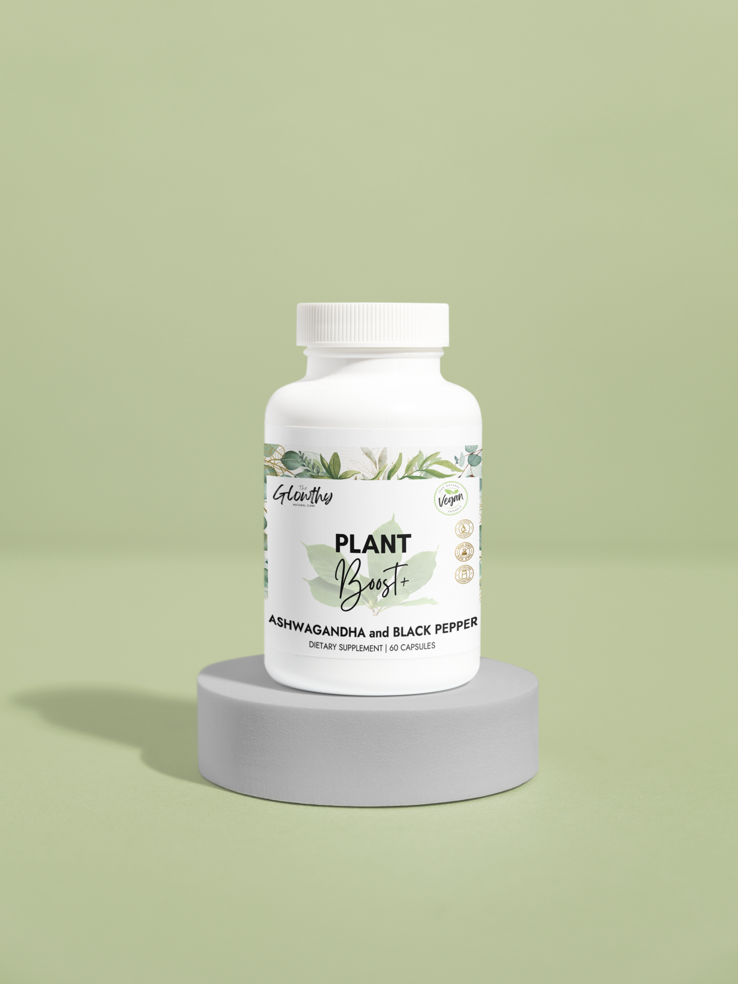 Ashwagandha Supplement PLANT BOOST+ Ashwagandha and Black Pepper Supplement, empowers you to feel centered, energized, and in control, bottle 60 vegan capsules, on a pedestal.