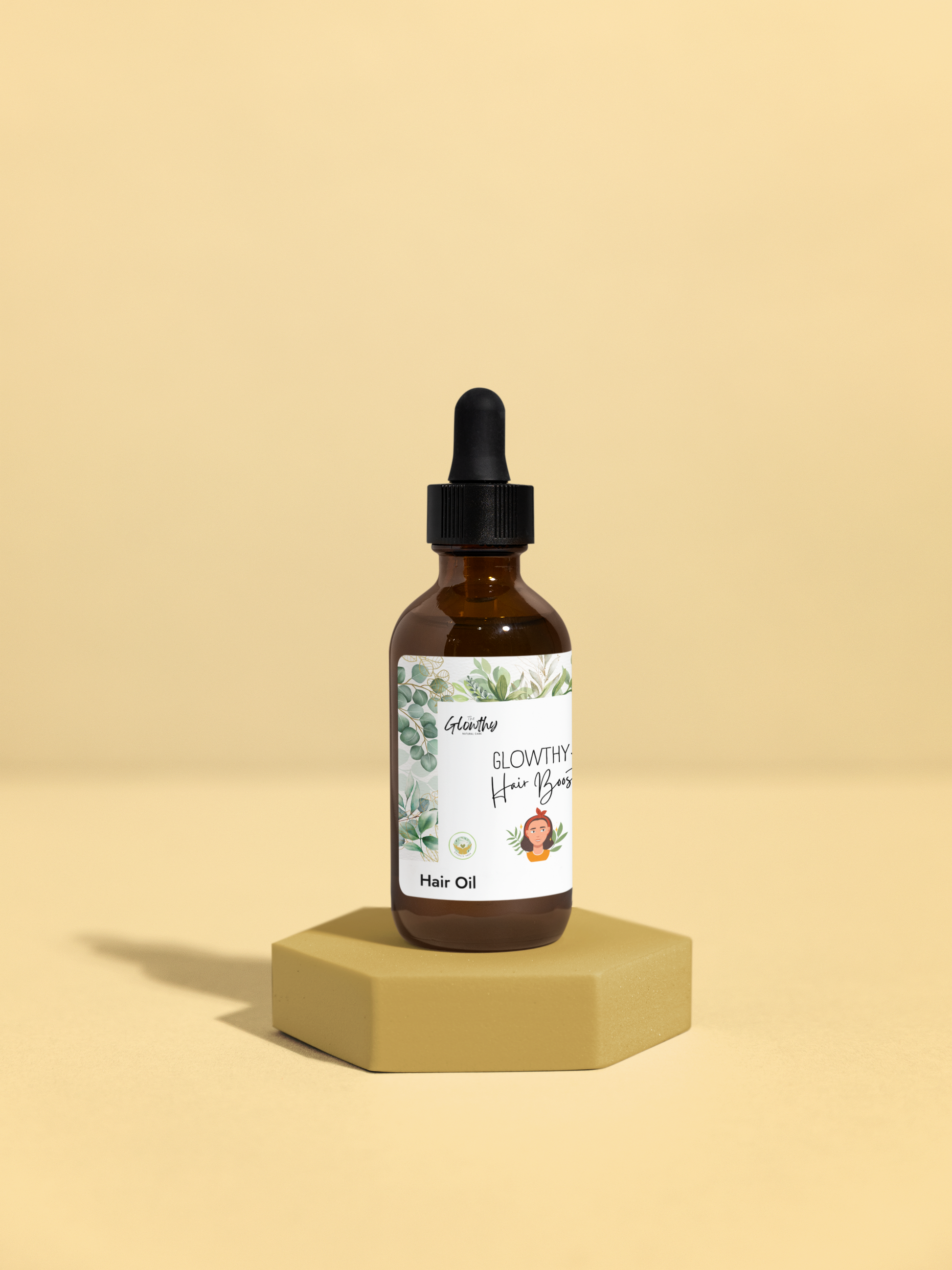 GLOWTHY+ HAIR BOOSTER Hair Oil 2oz bottle with black dropper on beige background.