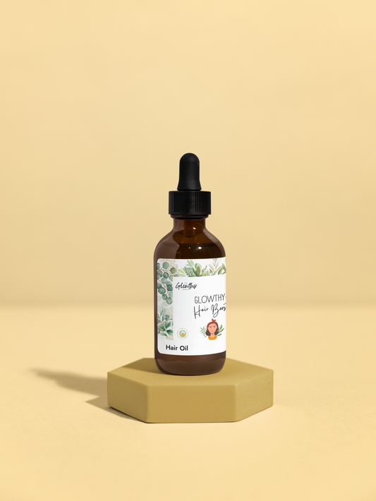 GLOWTHY+ HAIR BOOSTER Hair Oil 2oz bottle with black dropper on beige background.