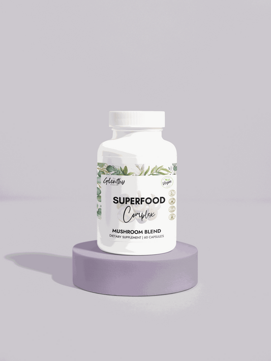 Mushroom Powder Benefits SUPERFOOD COMPLEX Mushroom Blend Supplement bottle with 60 capsules, featuring Cordyceps, Shiitake, and Lion's Mane for brain and energy support. Discover the Mushroom Powder Benefits. Power through your busiest days with focus, clarity, and natural energy. Your daily ally for enhanced vitality and wellness. bottle on a pedestal.