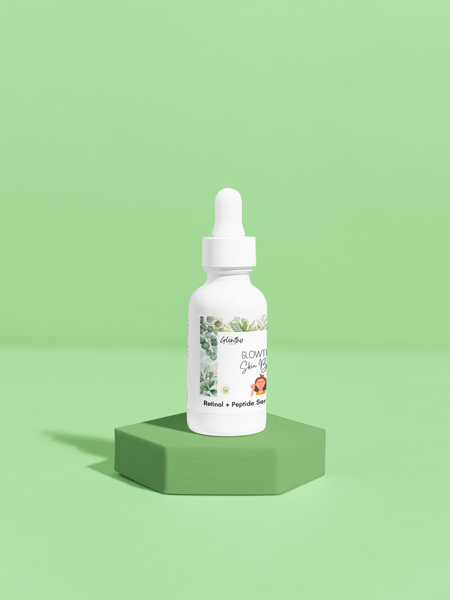 Retinol and Peptide Face Serum in white glass bottle on green background.