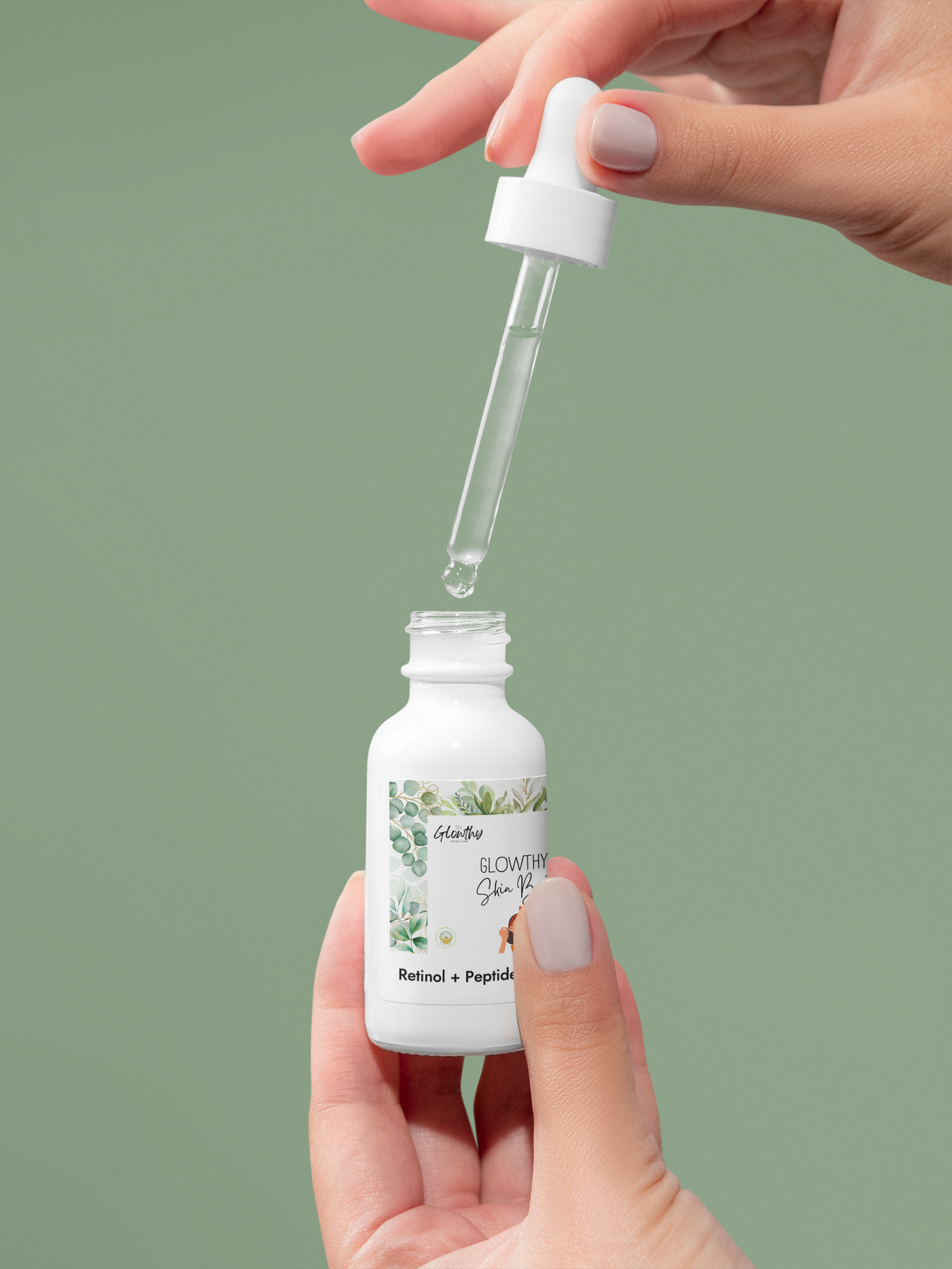 Retinol and Peptide Face Serum in white dropper bottle on green background.